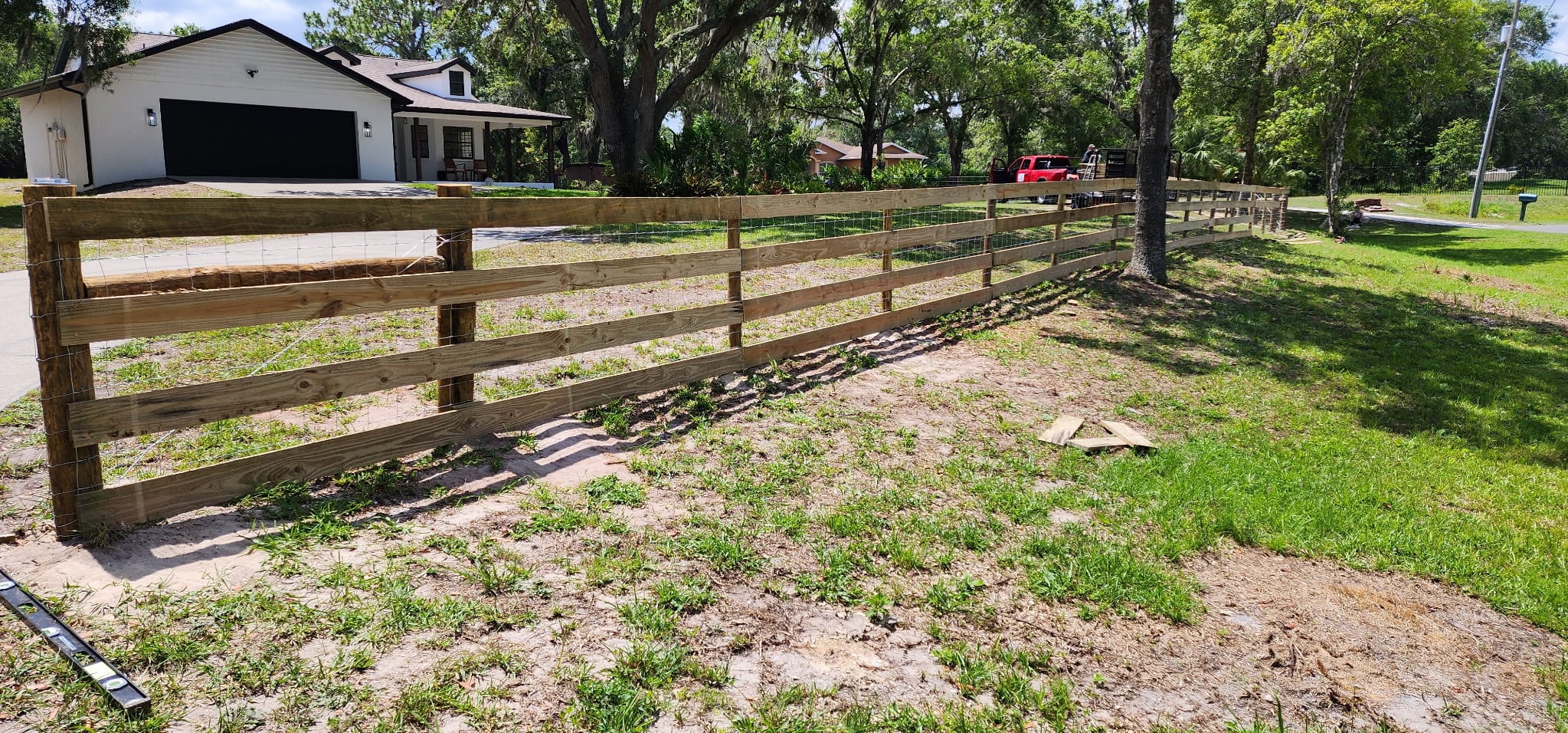 Wood board rail paddock fence built by Wilson's Fencing